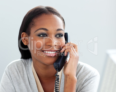 Close-up of a confident businesswoman on phone
