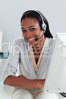 Charming ethnic customer service agent with headset on