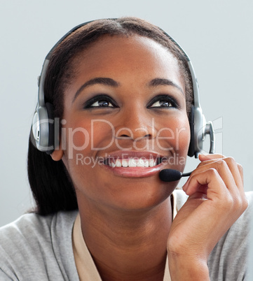 Close-up of a customer service representative with headset on