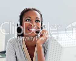 Afro-american businesswoman using headset