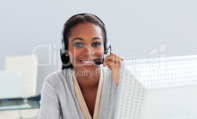 Afro-american customer service representative with headset on