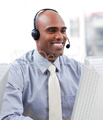 Confident businessman working at a computer