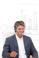 Smiling mature businessman in a meeting