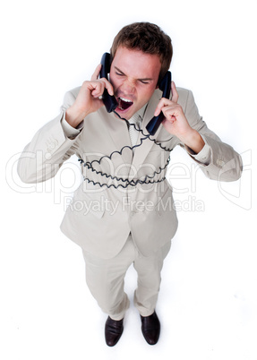 Furious businessman tangle up in phone wires