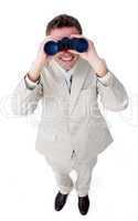businessman looking through binoculars