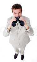 businessman using a pair of binoculars