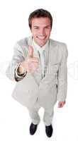 Positive businessman with thumb up