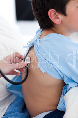 A doctor checking a child's respiratory rate