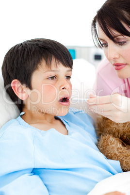 nurse taking her patient's temperature
