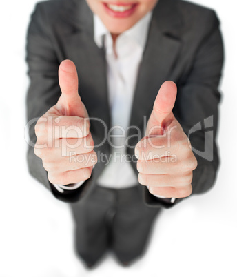 Close-up of a businesswoman with a thumbs up