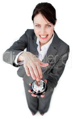 Cheerful businesswoman using a service bell