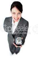 Charming caucasian businesswoman showing a service bell