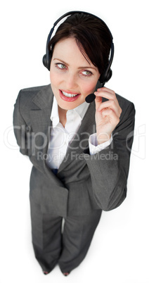 Beautiful young businesswoman talking on a headset