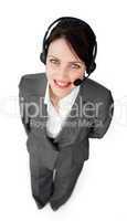 Confident customer service agent using a headset