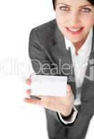 Charismatic businesswoman showing a white card