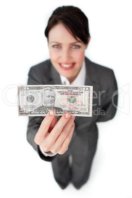 Charming businesswoman showing a bank note