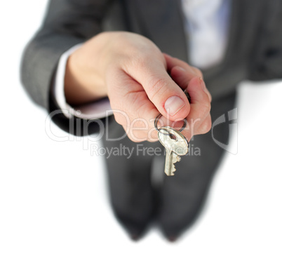 Close-up of a businesswoman holding a key
