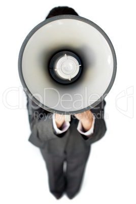 Businesswoman giving instructions with a megaphone