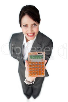 Cheerful businesswoman holding a calculator