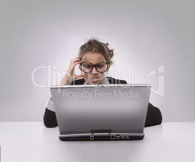 Confused woman using PC