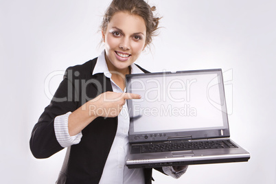 pretty businesswoman holding laptop