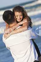 Man and Woman Couple In Romantic Embrace On Beach