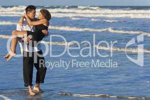 Man Carrying Woman in Romantic Embrace On Beach