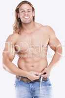 Athletic sexy male body builder with the blonde long hair. gladi