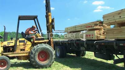 Forklift Unloading Construction Lumber 02