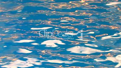 HD Illuminated blue water surface, closeup