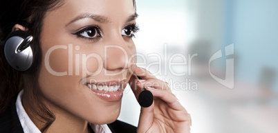 isolated portrait of a beautiful helpdesk or support line operat
