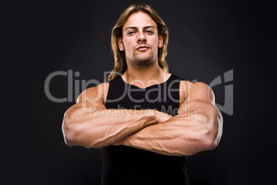 Sexy muscular man isolated on black