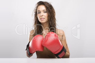 Beautiful woman with red boxing gloves