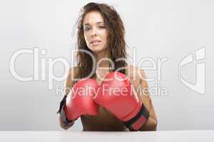 Beautiful woman with red boxing gloves