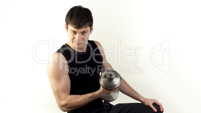 Bodybuilder exercising with weight