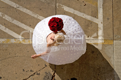 Bride Twirling in Parking Lot