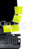 black monitor with sticky notes