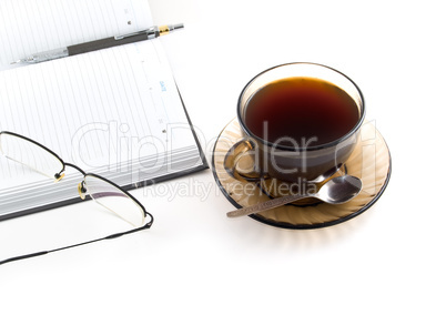 daily planner and cup of coffe