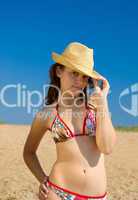 Beautiful girl at the beach on a hot summer?s day