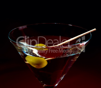 martini glass and olive