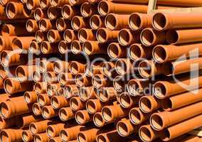 Stacked PVC  orange pipes