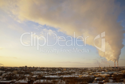 Pipe with smoke in winter sunrise time lapse