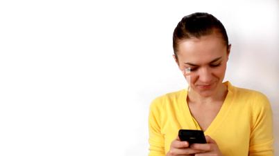 Woman Sending a Text Message / sms