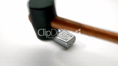 Phone stress destroying telephone with a hammer