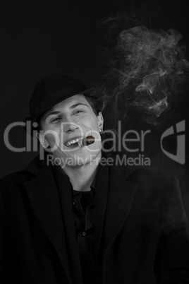 Man in black hat smoke cigar and smile