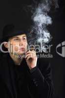 Man in black hat smoke cigar