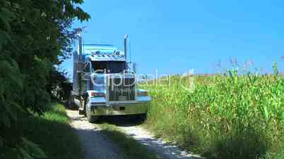 Semi Truck Driving Down Road