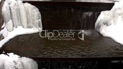 pan on frozen waterfall