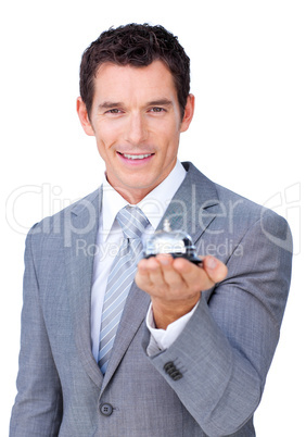 Assertive businessman showing a service bell