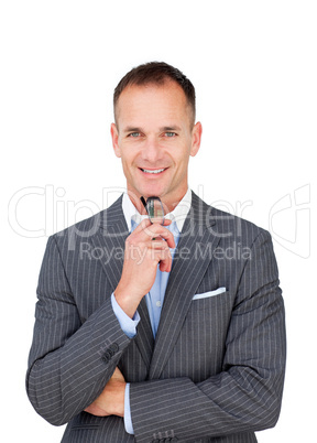 Smiling businessman holding glasses